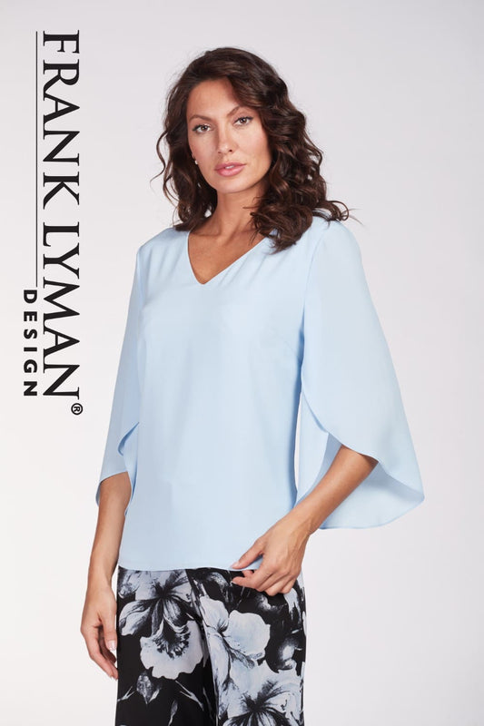 Frank Lyman Woven Top Style 186148 Powder-Blue from BelleMiaBoutique.com